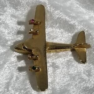 Pisces plane (needs pin back) 1 3/4" x 2 1/2"  1.1793a